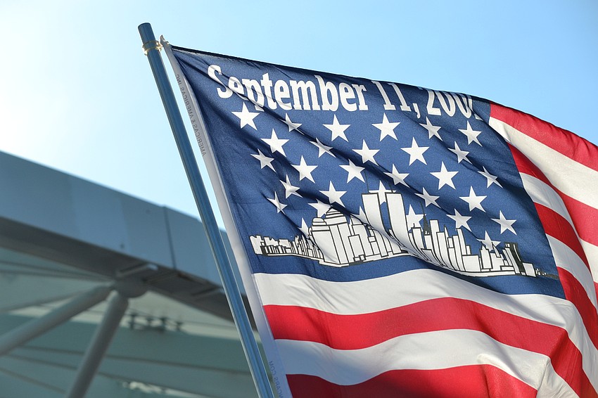 Fred Fischer flew a commemorative flag in honor of his friend and 9/11 victim Gerald Olcott.