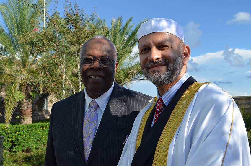 Sarasota City Mayor Willie Shaw with Hassan Hares of the Islamic Society of Sarasota and Bradenton.