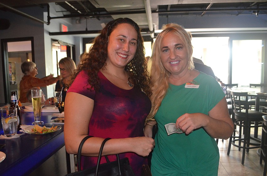 Aurora Kane of Century 21 and Penelope Mabrey of SERVPRO Bradenton