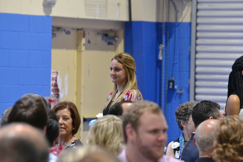 CYD Star Student and Marie Selby Botanical Gardens board member Marina Mazzarantani stands while students are being recognized.