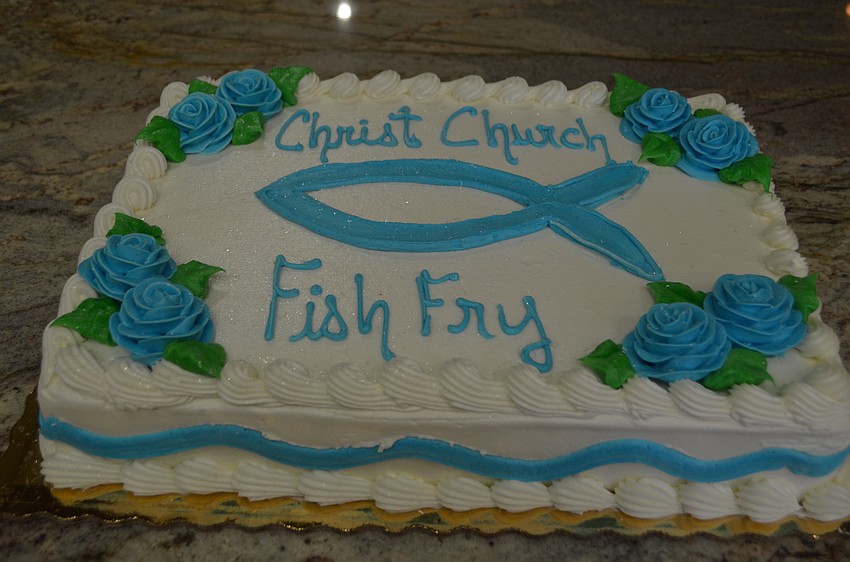 Guests enjoyed a chocolate cake from Publix after eating the fish dinner.