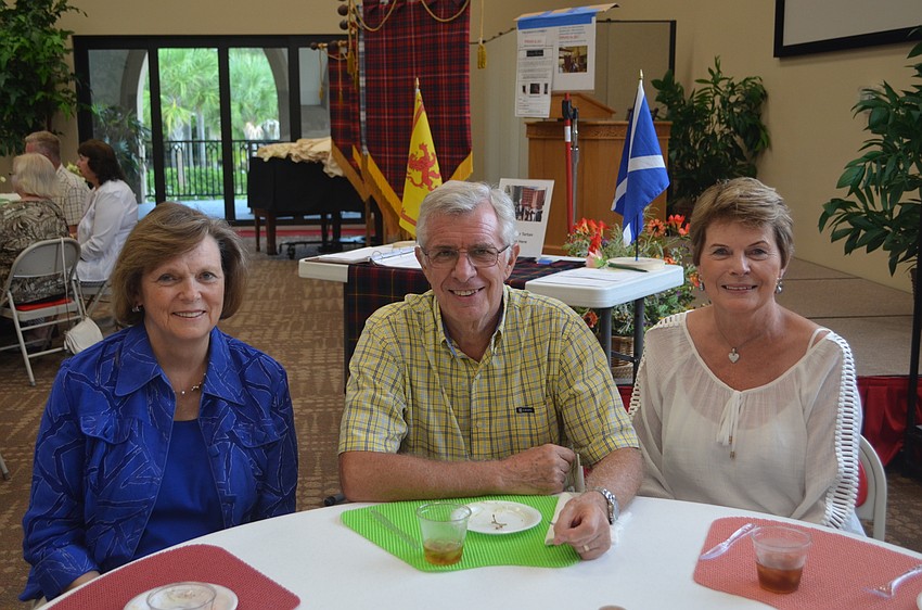 Elaine McClure, Pastor Norman Pritchard and his wife, Joan