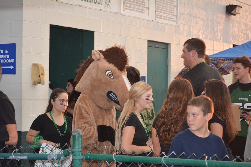 Even a mascot has to stand in line at the big game.