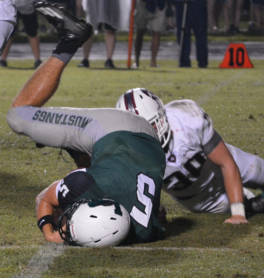 It was that kind of night for Lakewood Ranch quarterback Justin Curtis, who was getting dumped by Braden River linebacker Gavyn Purdy.