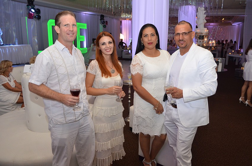Travis Carlson, Gabriela Bueno, Diana Palacios and Guillermo Palacios.