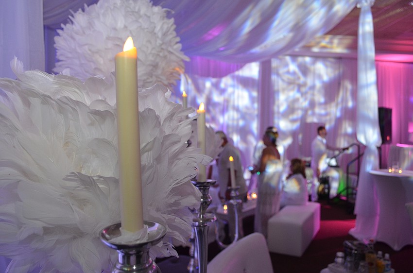 The ballroom at Michael’s On East was transformed into a sea of white with colorful spotlights as accents.