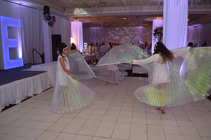 Dancers perform for attendees.