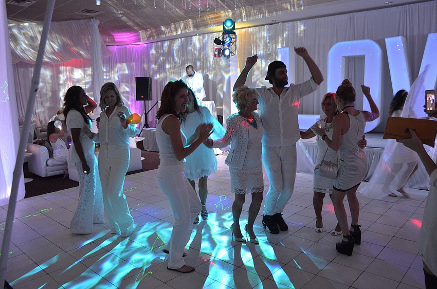 Attendees show off their moves on the dancefloor.
