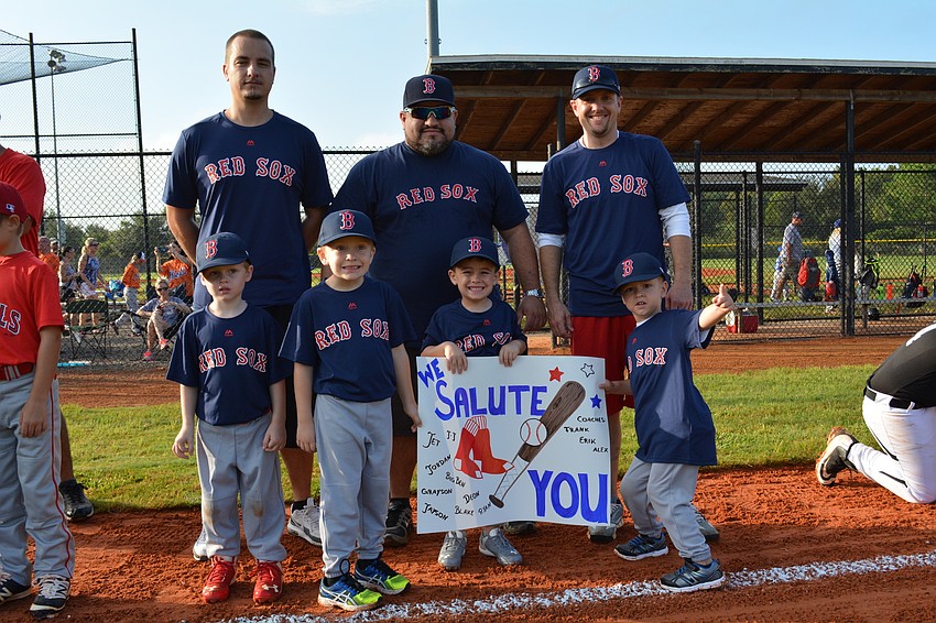 Teams held handmade banners showing support for military and law enforcement.