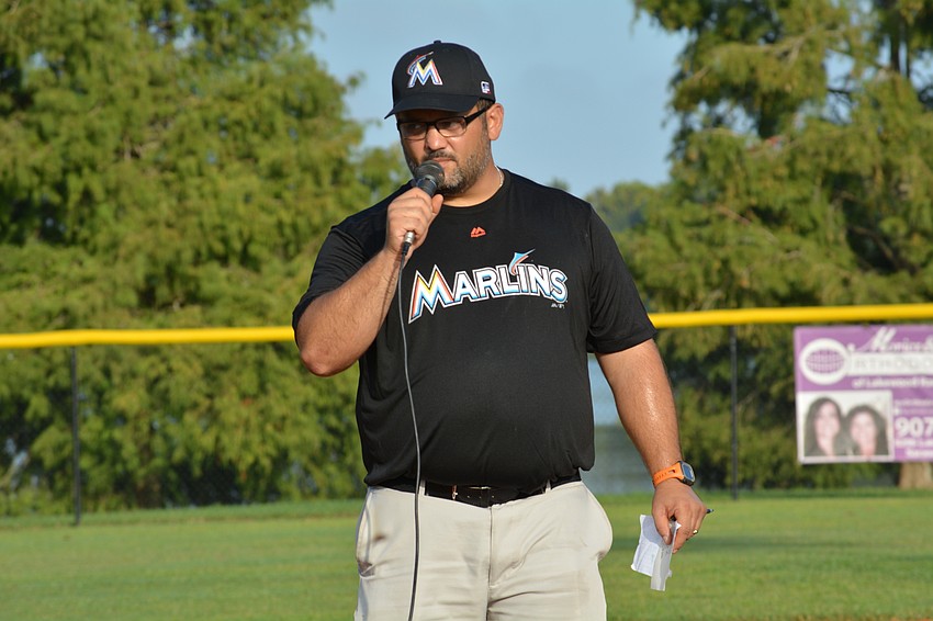 League president Steve Marrero welcomes the crowd for opening day.