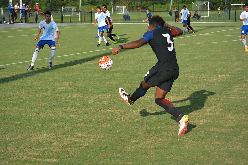 Christopher Gloster of the U.S. lets loose a shot on goal.