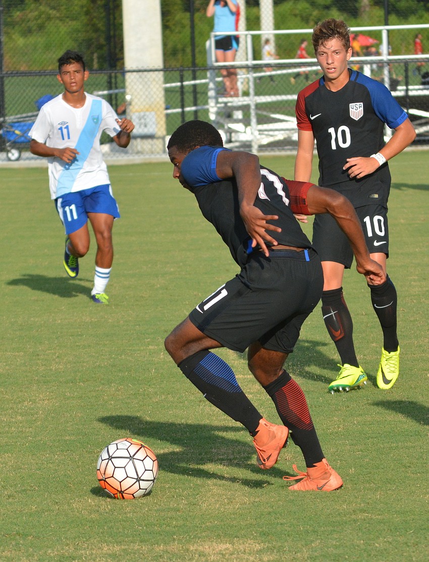 Zyen Jones shows his style as the moves the ball down the field against Guatemala.