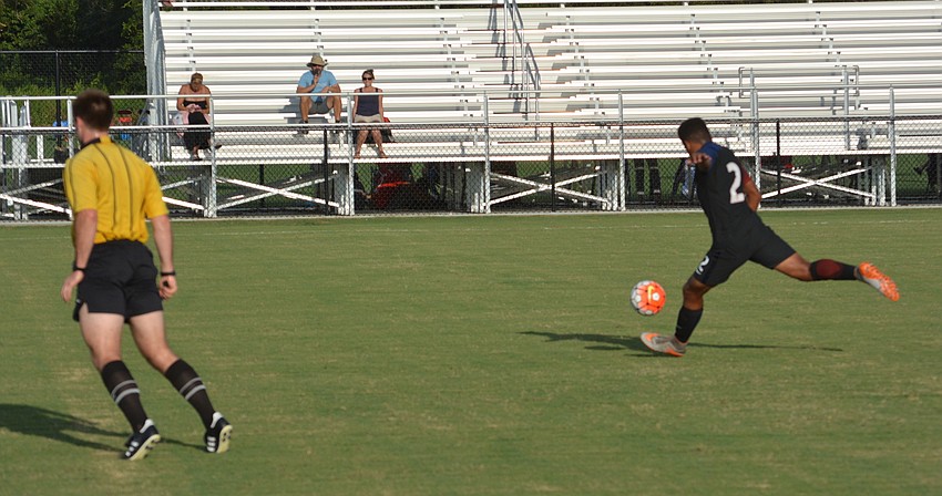 Jaylin Lindsey shows good form on his kick, but the official, that's another story.