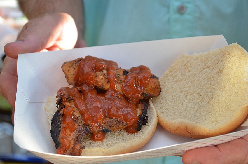 The barbecued chicken sandwich from Holloway BBQ topped with a mango chipotle barbecue sauce made using the Passion Wheat ale.