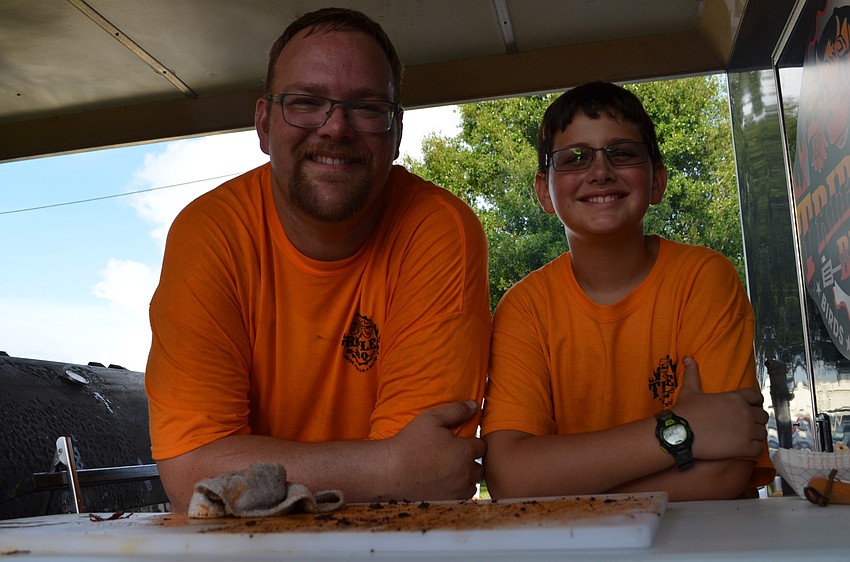 Matt Ashley and his son Matthew of Triple B BBQ. He prepared burnt ends using the NITRO Bell Cow, a milk chocolate porter in his competition entry.