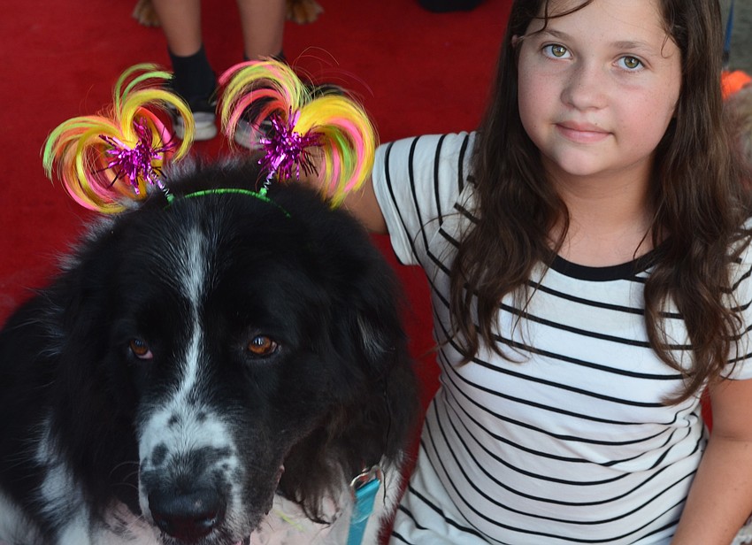 Bella Crouse, 10, came from Arcadia with her dog Freckles to attend the Giving Challenge.