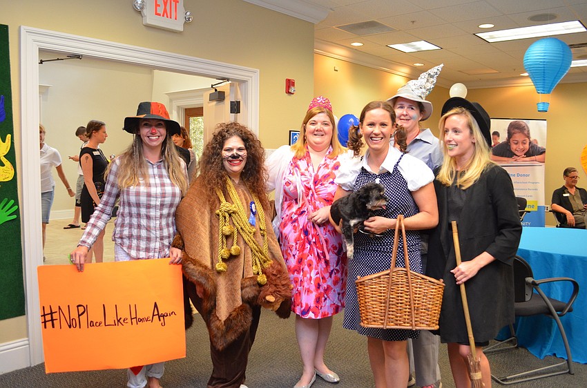 Employees of Harvest House dressed as the cast of 