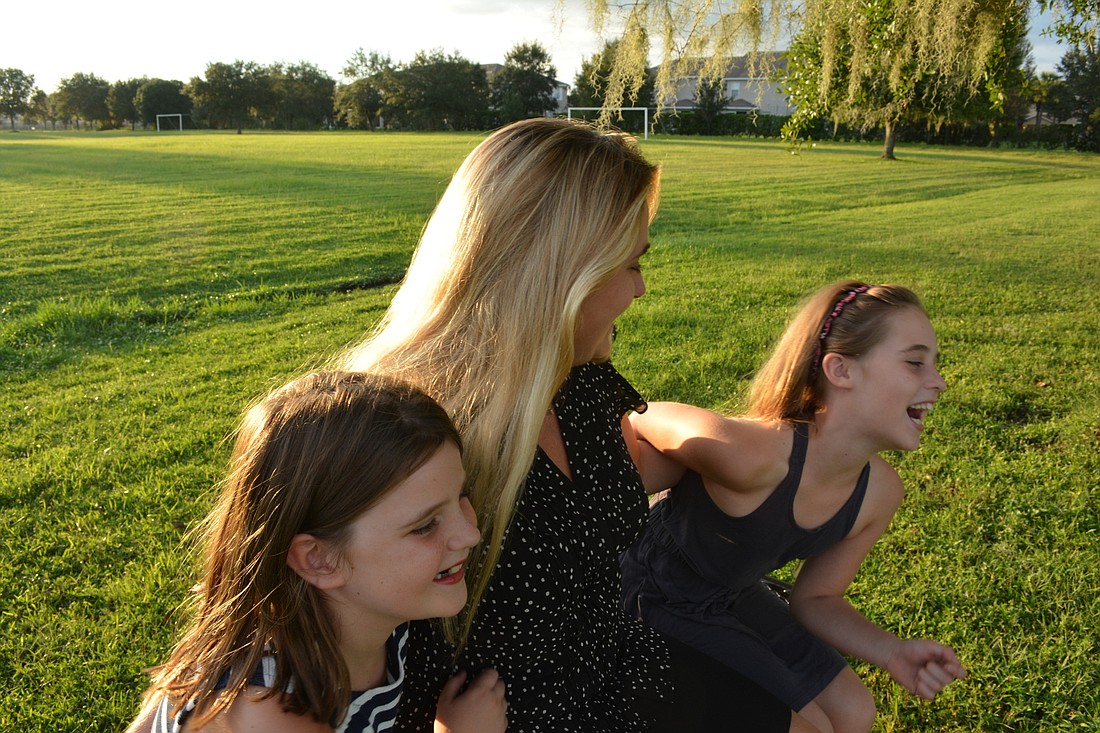 Hailey, Rachel and Audrey Weeks often enjoy evenings at the park.