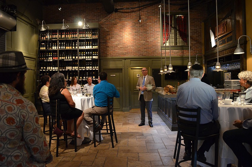 The group from Chabad of Sarasota enjoyed a few rounds of whiskey from expert Turner Moore at Michael's Wine Cellar Thursday, Sept. 22.