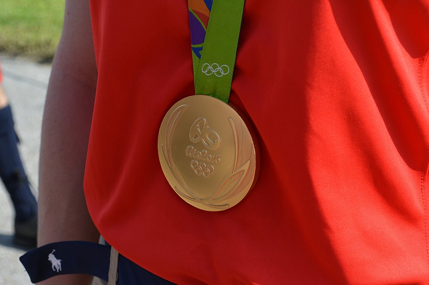 Amanda Polk had an opportunity to show off her Olympic gold medal.