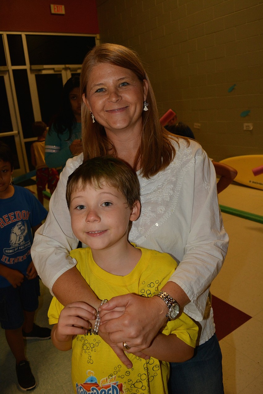Justice Merritt and his mom Shelley enjoy the night together.