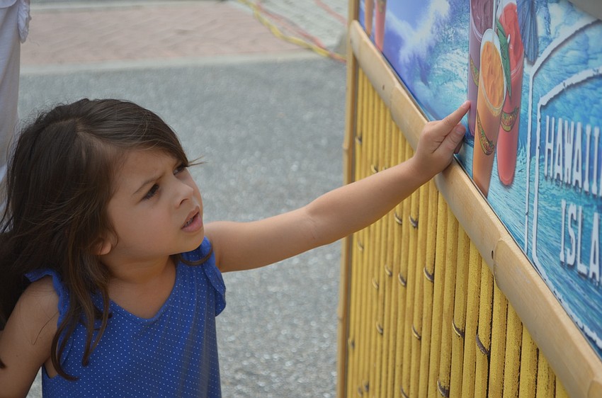 Lakewood Ranch's Natalja Munoz, 4, points at the smoothie she can't wait to get.
