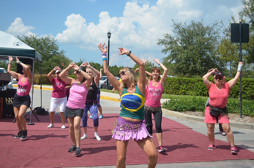 Sandrina Bellino, a Zumba instructor in Lakewood Ranch, and her team of Zumba dancers, show off their catchy dance moves.