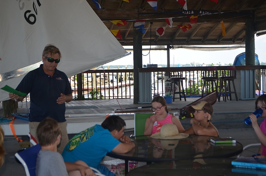 Sarasota Sailing Squadron Director, Craig Bridges, explains the basics of sailing to the group.