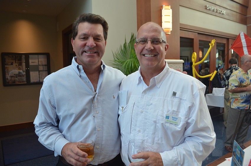 Event emcee Bob Harrigan of ABC 7 and Sarasota Bay Watch president Larry Stults