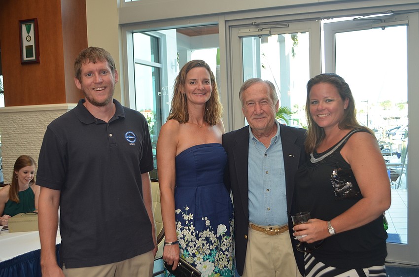Mote Marine Laboratory employees Ryan Schloessler, Sheri Barton, Carl Luer and Lisa Angely