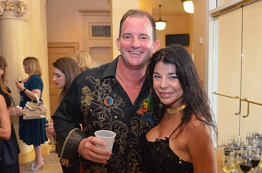 Robb Brooks with Anita Wexler, the artist who painted superheroes “Parker” and “Brooklyn.”