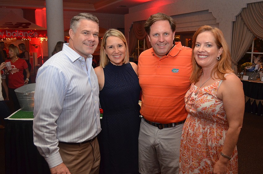 Jason and Leigh Hughes with John and Retta Wagner.