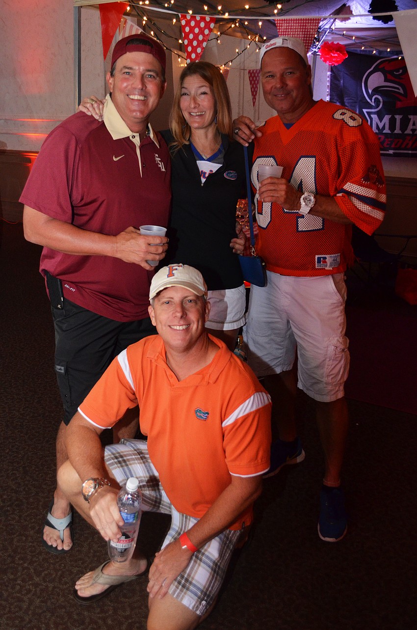 Garry Battaglia (front), Joel and Laura Potter and Scott Lang.