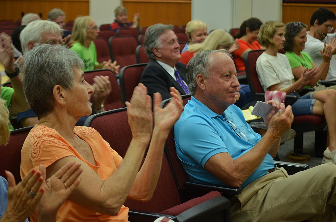 The Charter Review Board's unanimous decision to remain an elected body was met by applause from audience members.