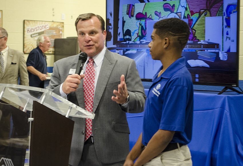 Boys & Girls Club of Sarasota County President and CEO Bill Sadlo introduces 2016 Youth of the Year Rickey Tedesco to perform the national anthem.