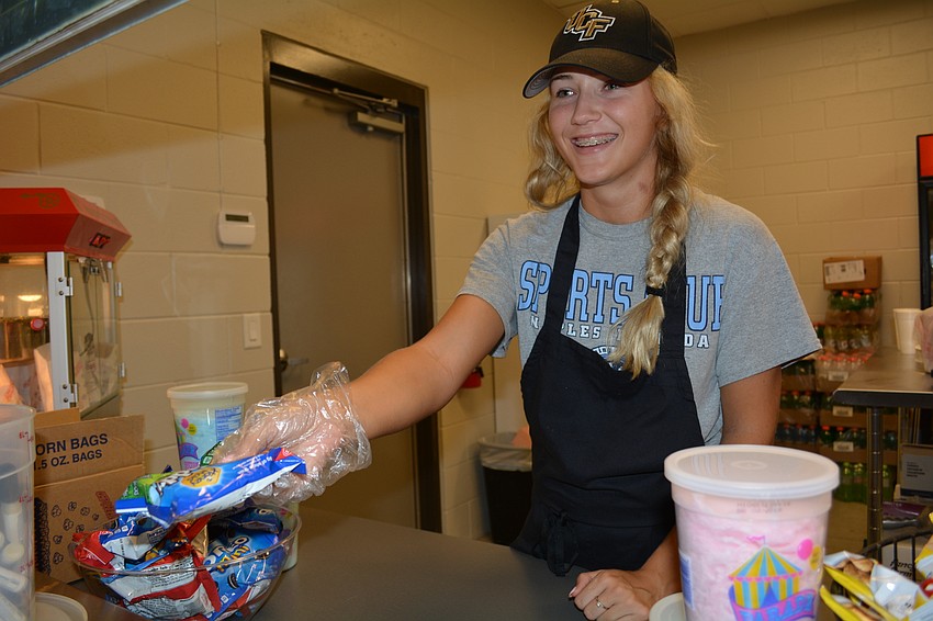 Taylor Hamilton sells concessions with her family, owners of Hamilton's Vending.