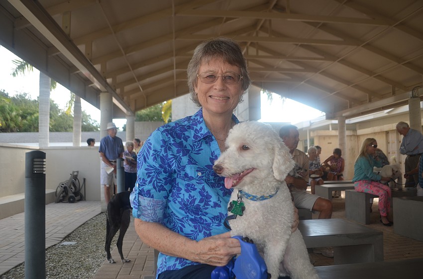 Barbara Ford-Coates and Phineas, a 4-year-old miniature poodle
