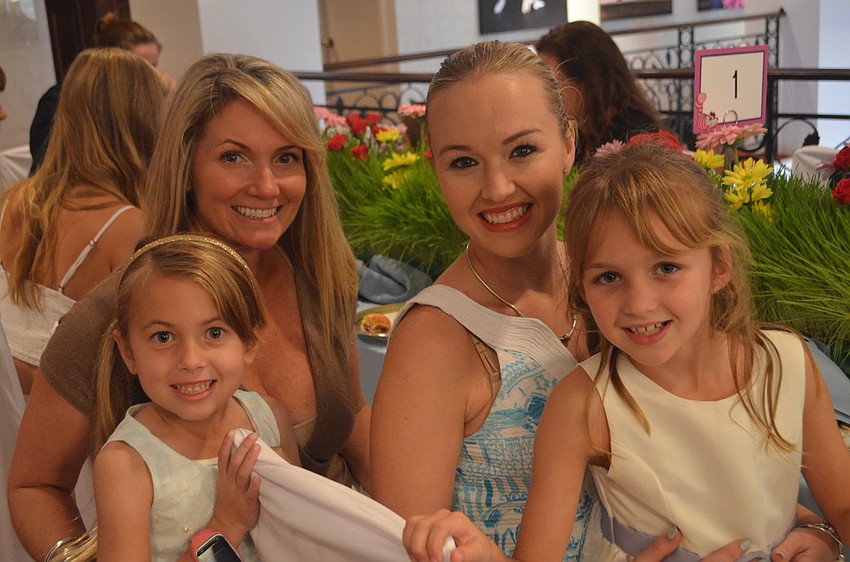 Jen Chessler and daughter Samantha, 6, with Monique and Sophia Paterson, 9