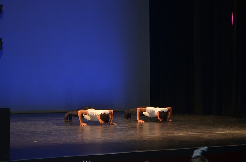 Margaret Barbieri Conservatory dancers Alexandre Barbosa and Taiguara Goulart do push ups for the crowd.