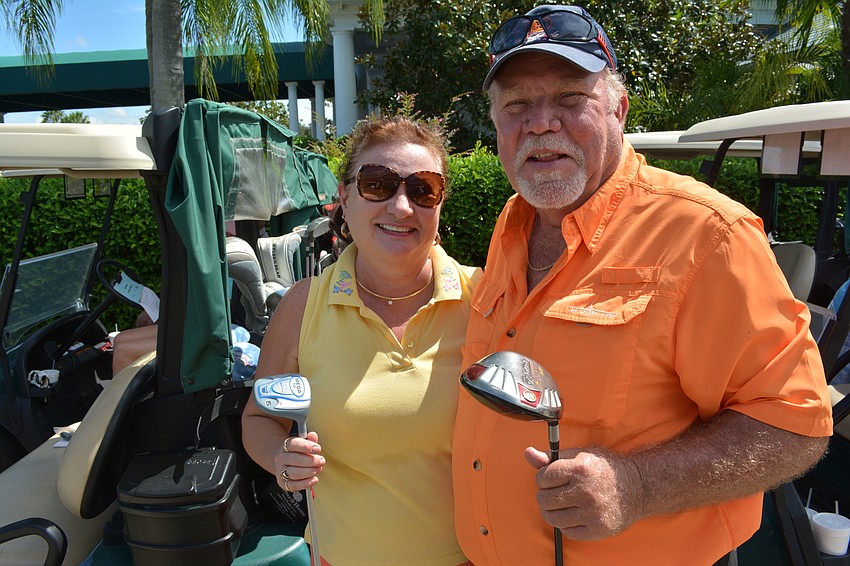 Elks' Tonya and Jerry Ditty enjoy the tournament they organized. Tonya made the pulled pork and baked beans for the dinner.