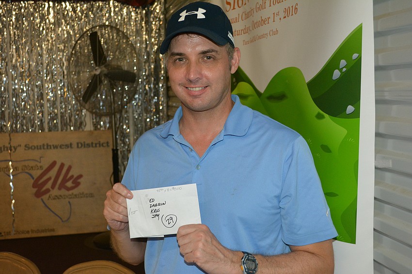 Daren McDonald was captain of the winning team that included Ed Defreitas, Jay Urzykowski and Kris Murphy. They were seven under for nine holes when the tourney was halted by rain and lightning.