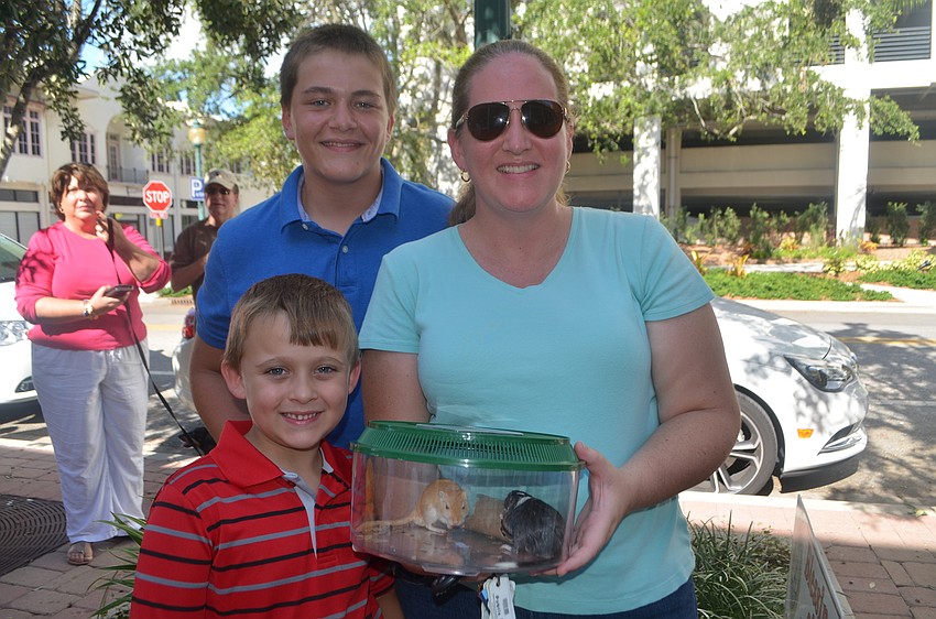 Jackson Petty, 7, with his brother, Jonathan,12, and mom, Heather, with their gerbils Sparky and Forest.