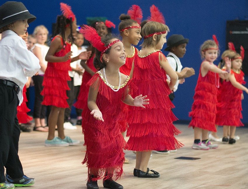 Sofia Rodriguez performs with the Bay Haven School of Basics Plus Broadway Club during a school assemble to celebrate the 90th anniversary. Friday, Sept. 30.