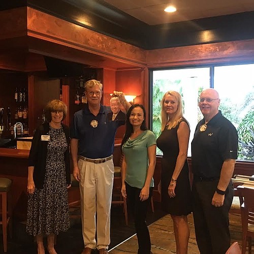 Carolyn Kofler, Lt. Governor, Steven Branham, President, holding a picture of Gary Frechette, Kiwanis Florida Governor, Tayna Lilly, Second VP and President Elect for 2017-2018, Susan Phillips, First Vice President and Joe Walsh, Immediate Past President