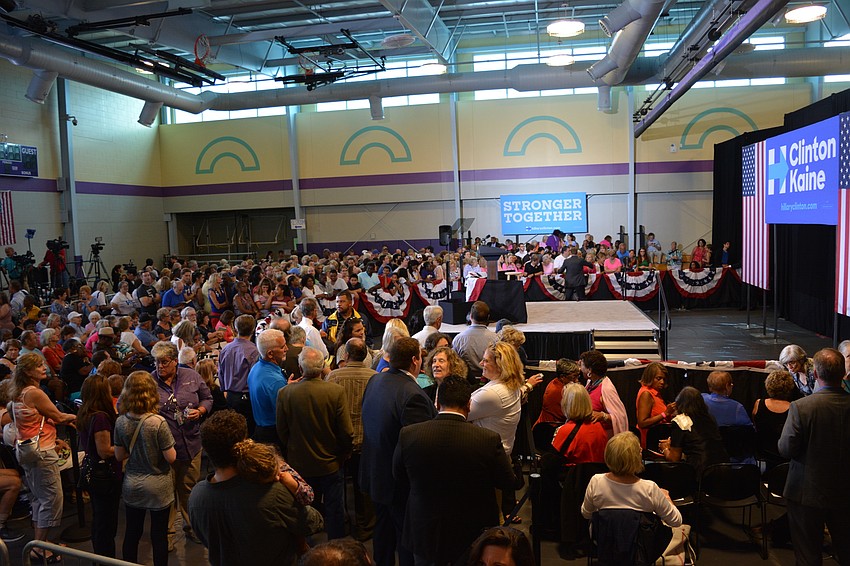 Hillary Clinton supporters file into the R.L. Taylor Community Complex.