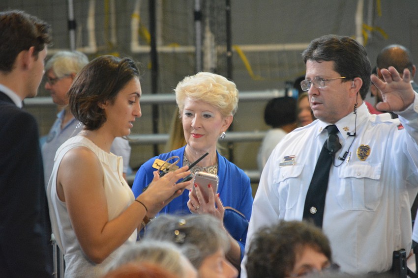 Democratic Party of Sarasota Chairwoman Christine Jennings speaks with a Hillary Clinton official.