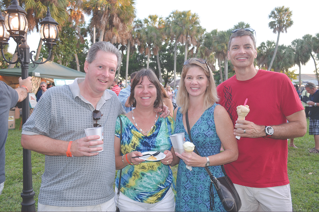 Mark and Sue Gates and Amy and Kevin Wells enjoy last yearâ€™s Taste of St. Armands.