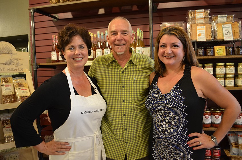 Chef Nicole Coudal, of MyDeliciousBlog.com, Brandon Snyder of Opici Wine, a family distributor, and A Savory Palate owner Paulette Callender