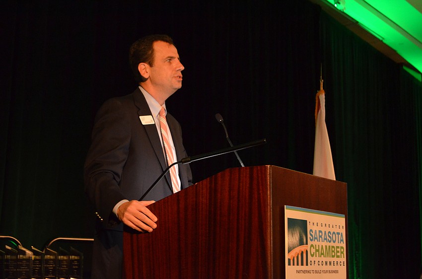 Charlie D. Bailey, 2016-17 chair-elect of the board, welcomes guests to the 96th annual Membership Meeting and Luncheon Friday, Oct. 7 at Hyatt Regency Sarasota.