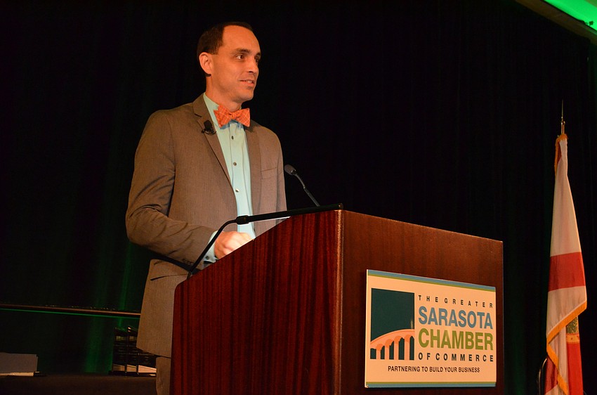 Greater Sarasota Chamber of Commerce President and CEO Kevin Cooper addresses the crowd in his first appearance in his new role.